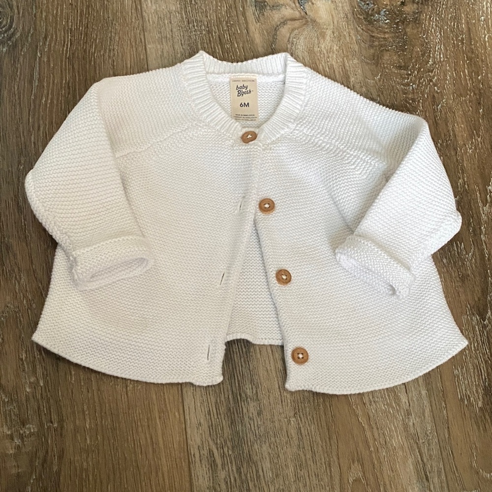 Cozy White Knit Baby Sweater with Button Closures